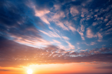 Fototapeta na wymiar Fantastic sunset sky and setting sun.
