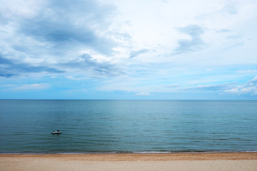Fototapeta na wymiar The beach with blue sky and blue sea