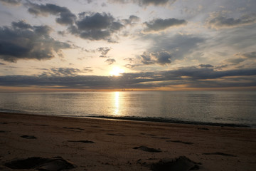 Fototapeta premium Beautiful sunset at the beach in the evening