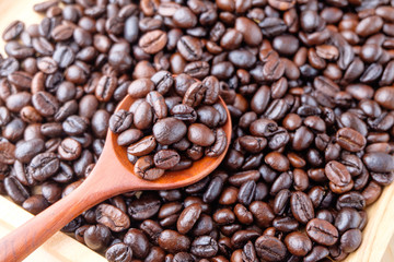 coffee beans on wooden background