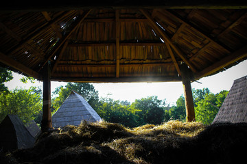Fototapeta na wymiar Village view from the straw deposit