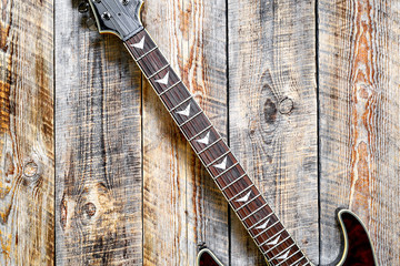 Electric guitar on wooden background vintage look