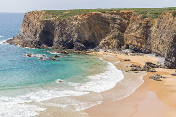 Cliffs, rocks and waves in Zambujeira do Mar