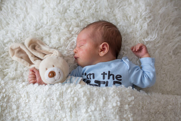 Little newborn baby sleeping, baby with scin rash © Tomsickova
