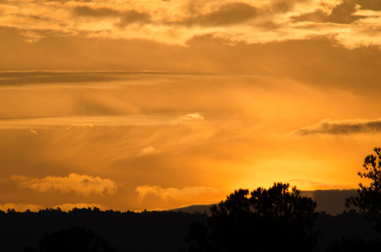 Golden predawn clouds over the hills near Anniston, Alabama, USA