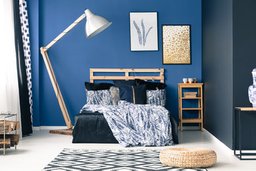 Blue bedroom with gold accents