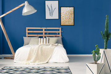 Blue walls and light bedding