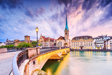 Zurich, Switzerland. View of the historic city center with famous Fraumunster Church, on the Limmat...