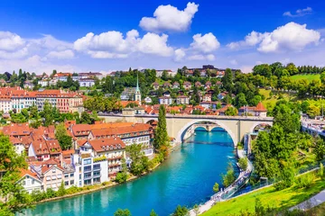  Bern, Switzerland. View of the old city center and Nydeggbrucke bridge over river Aare. © SCStock
