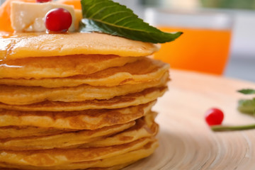 Stack of delicious pancakes, close up