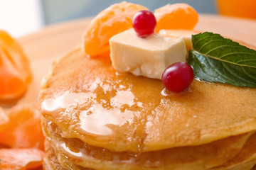 Stack of delicious pancakes, close up