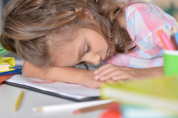  girl sleeping on drawings
