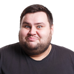 Obraz premium Man expressing wonder and happiness on face