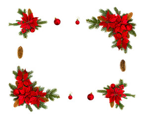 Christmas decoration. Flower of red poinsettia, branch christmas tree, christmas ball, red berry and cone spruce on a white background with space for text. Top view, flat lay