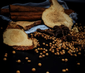 The Chinese herb on blak background,in abstract art design,blurry light around.