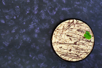 Cake pigeon's milk on dark background