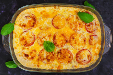 Eggplant casserole. Moussaka on dark background