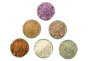 Ancient minerals - Clay of several colorsclay powder and mud mask for spa, beauty concept on white