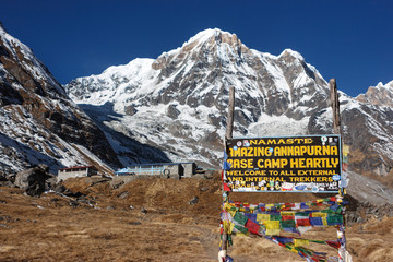 Sunrise view of the Annapurna Base Camp with welcome sign, Nepal