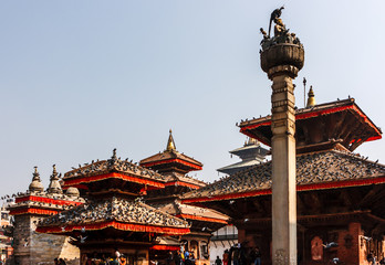 Obraz premium Temples of Kathmandu's Durbar square, covered with pigeons