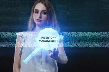 The concept of business, technology, the Internet and the network. A young entrepreneur working on a virtual screen of the future and sees the inscription: Inventory management