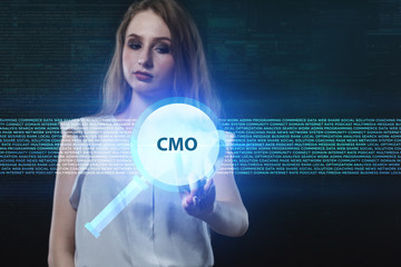 The concept of business, technology, the Internet and the network. A young entrepreneur working on a virtual screen of the future and sees the inscription: CMO