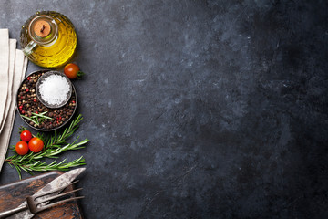 Cooking ingredients and utensils on stone table