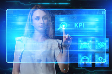 The concept of business, technology, the Internet and the network. A young entrepreneur working on a virtual screen of the future and sees the inscription: KPI