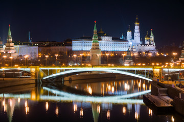 Fototapeta na wymiar Big Stone Bridge near the Kremlin - night view with reflection in the river