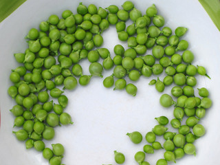 Ripe green peas on a plate