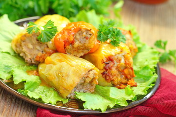 Baked peppers stuffed with meat, rice and vegetables