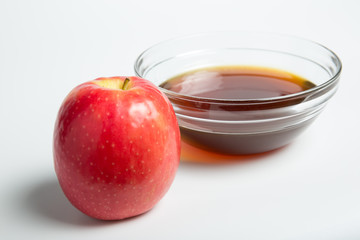 red apple with honey