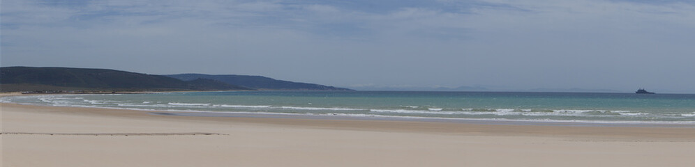 Barbate beach in May panoramic view. Barbate is a coastal town located in the province of Cádiz, It is situated at the mouth of the River Barbate, between Zahara de los Atunes and Los Caños de Meca.