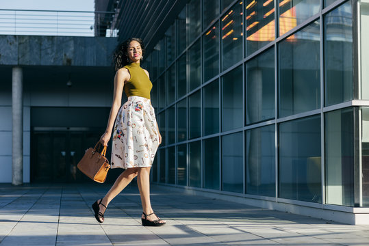 Casual Woman Walking On Street