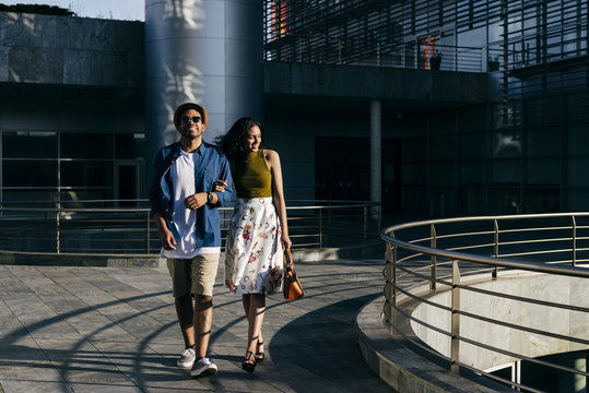 Couple walking in city