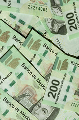 fondo con billetes mexicanos de 200 pesos