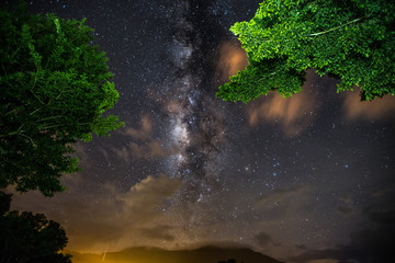 Fog, milky way and nebula in Thailand outback. Beautiful milky way astrophotography background.