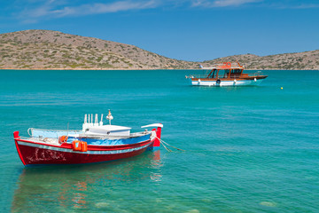 Fototapeta premium Small fishing boat at the coast of Crete, Greece