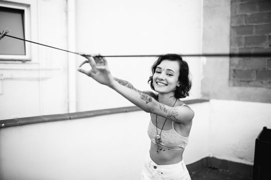 Tattooed young girl smiling