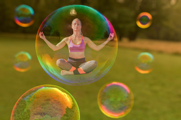 A yoga woman is hovering in a soap bubble(mixed media)