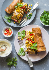 Fajita sandwich. Chicken fajitas spicy grilled baguette on a gray background, top view. Flat lay