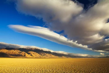 Tuinposter Clouds rolling over Steens Mountains © David Johnson