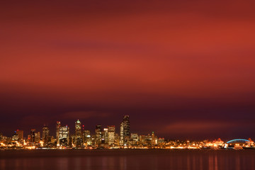 Seattle skyline under fiery dawn sky