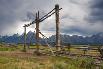 Log fence and Teton Mountains