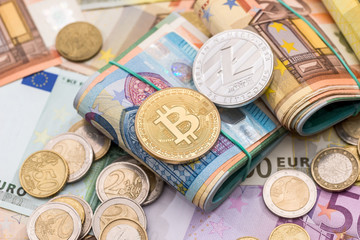bitcoin, litecoin, euro coin and bills, money concept