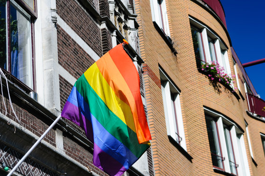 Amsterdam, The Netherlands, 3rd August 2013 - A Rainbow Flag flies from a house during Amsterdam Gay Pride