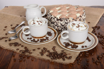 coffee with whipped cream and chocolate and coffee with cream cake