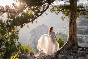 Beautiful girl in amazing dress outdoor