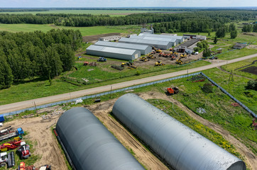 Verhovina, Russia - June 14, 2017: Aerial view onto modern machine yard of agricultural firm. Sverdlovsk region