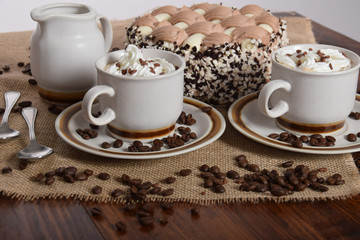 coffee with whipped cream and chocolate and coffee with cream cake